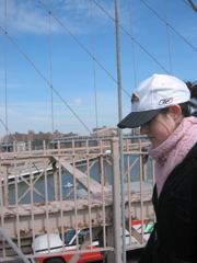 Catherine walking across the Brooklyn Bridge